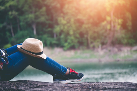 Female tourists in beautiful nature in tranquil scene, concept tourists backpack.の写真素材