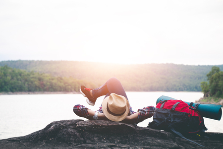 Female tourists in beautiful nature in tranquil scene, concept tourists backpack.の写真素材
