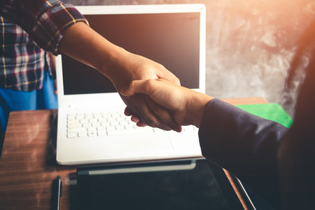 The hands of business people are willing to invest in business together in the office.の写真素材