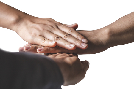 The hands of business people are willing to invest in business together in the office isolated on white background.の写真素材