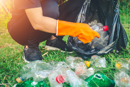Women volunteer help garbage collection charity environment.の写真素材
