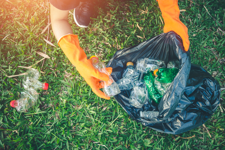Women volunteer help garbage collection charity environment.の写真素材