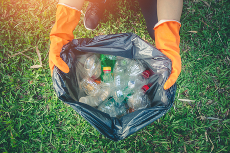 Women volunteer help garbage collection charity environment.の写真素材
