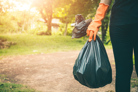 Women volunteer help garbage collection charity environment, concept cleaning.の写真素材