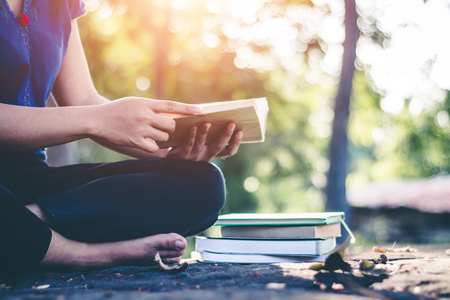 Women read books in quiet nature, concept read a books.の写真素材