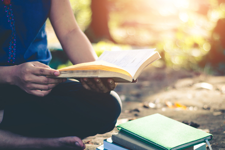 Women read books in quiet nature, concept read a books.の写真素材
