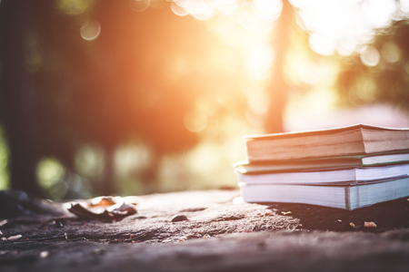 Close up books on the floor in nature.の写真素材