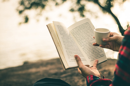 Women read books in quiet nature, concept read a books.の写真素材