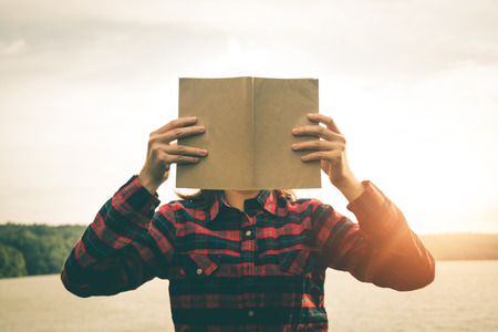 Women read books in quiet nature, concept read a books.の写真素材