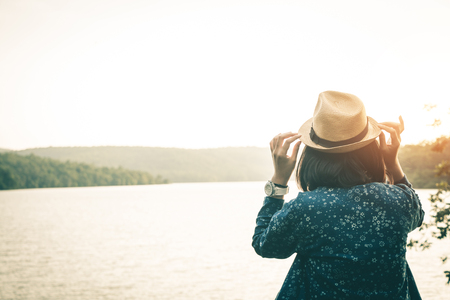 Female tourists in beautiful nature in tranquil scene, concept tourists backpack.の写真素材