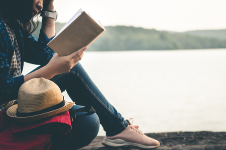 Women read books in quiet nature, concept read a books.の写真素材