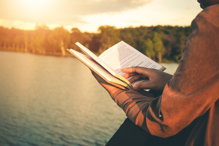 Women read books in quiet nature, concept read a books.の写真素材