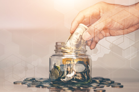 Saving money for future use, sustainability concept.の写真素材