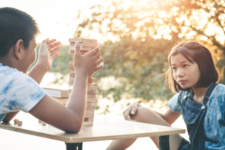 Children are playing stack high games to win the number one.の写真素材