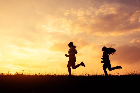 Jogging girl for health silhouette, Concept run for health.の写真素材