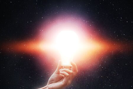 The lamp light of the stars in the sky in the palm.の写真素材
