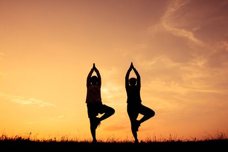 Silhouette girl yoga for health, Concept run for health.の写真素材