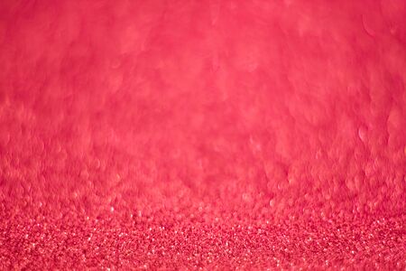 Pink shining lights sparkling glittering romantic backdrop blurred background.の写真素材