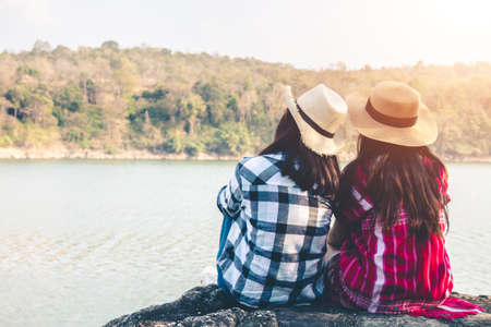 Women tourists in the midst of peaceful nature, Traveling of tourists only to find the beauty of nature.の写真素材