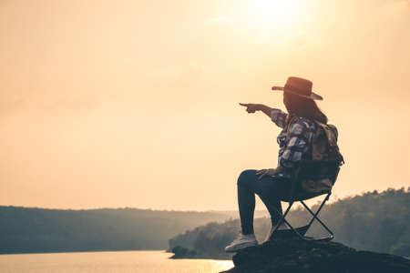 Women tourists in the midst of peaceful nature, Traveling of tourists only to find the beauty of nature.の写真素材