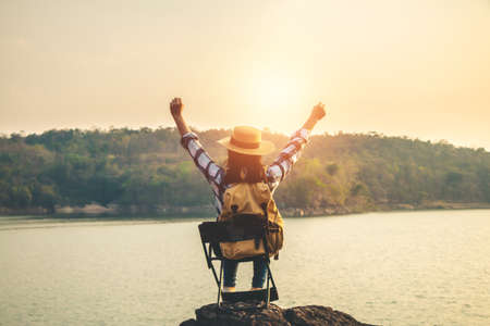 Women tourists in the midst of peaceful nature, Traveling of tourists only to find the beauty of nature.の写真素材