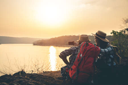 Women tourists in the midst of peaceful nature, Traveling of tourists only to find the beauty of nature.の写真素材