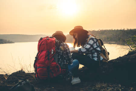 Women tourists in the midst of peaceful nature, Traveling of tourists only to find the beauty of nature.の写真素材