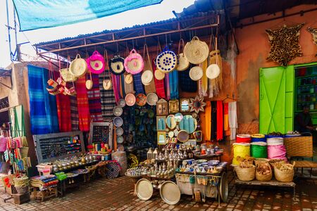 Marrakesh, Morocco - March 04 2019 Colourful store with various hand crated arts in the souk of Marrakesh.のeditorial素材