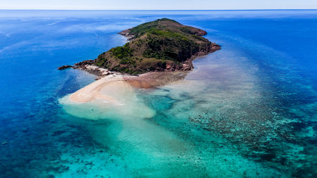Tropical Island Surrounded by Coral Reefsの写真素材