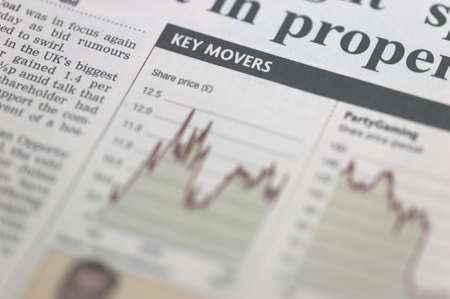 Section of a financial newspaper titled Key Moversの写真素材