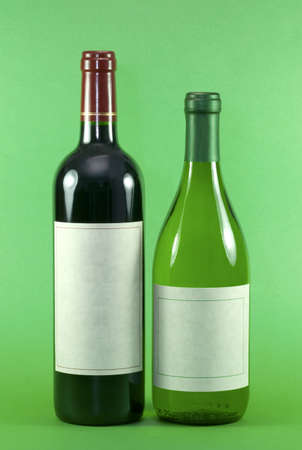 Red and White Wine Bottles with blank labelsの写真素材