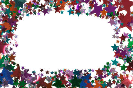 Multi colored shiny stars arranged around a blank space.の写真素材