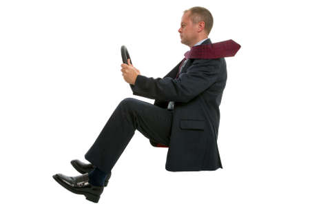 Concept shot of a businessman driving an environmentally friendly company car.の写真素材