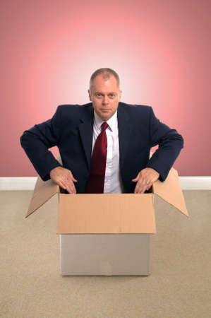 Businessman in a box. Concept image.の写真素材