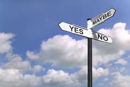 Concept image of a signpost with Yes, No or Maybe against a blue cloudy sky.の写真素材