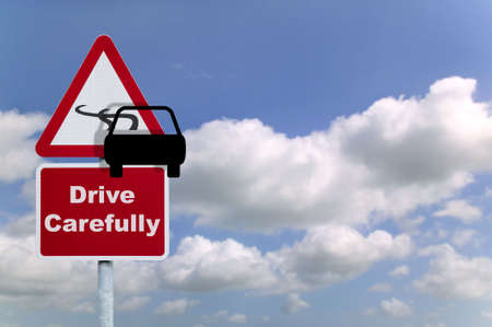 Drive carefully road signの写真素材