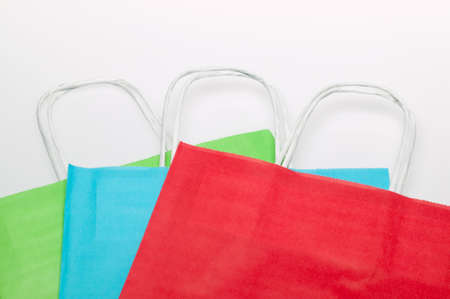 Three colourful shopping bagsの写真素材