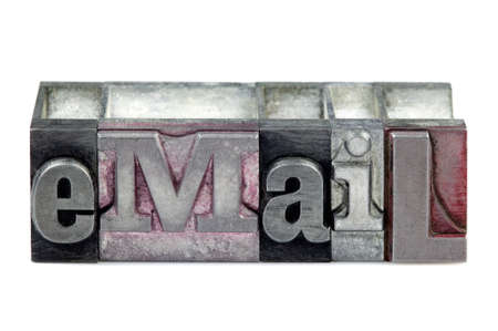 The word eMail in old letterpress printing blocks isolated on a white background.の写真素材