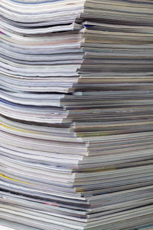 Close up of the corner in a stack of magazinesの写真素材