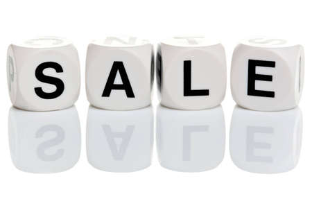 The word SALE in alphabet letter blocks isolated on a white background.の写真素材