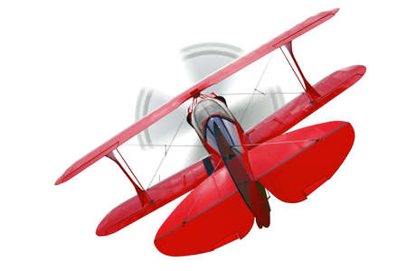 A red biplane, rear view with propeller in motion, isolated on a white background.の写真素材