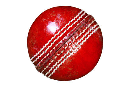 Photo of a red leather cricket ball isolated on white background with clipping path done using pen tool.の写真素材