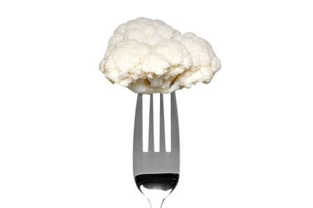 Photo of a cauliflower on a fork isolated on a white background, part of a series.の写真素材