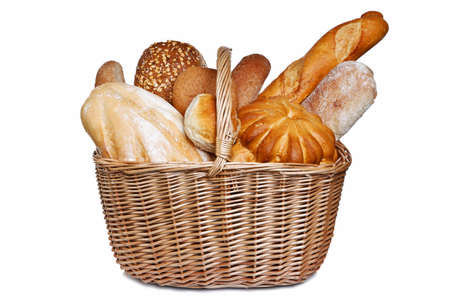 Photo of various types of bread in a wicker bascket isolated on a white background.の写真素材
