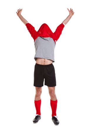 a footballer or soccer player cut out on a white backgroundの写真素材