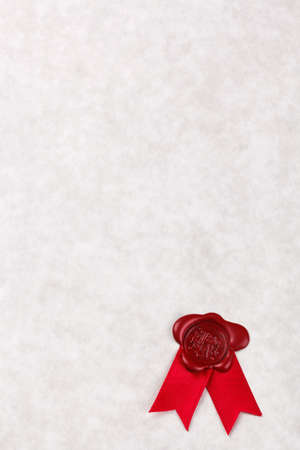 Blank sheet of parchment paper with a red wax seal and ribbon, add your own text to make a certificate, award, letter, diploma or other official document.の写真素材