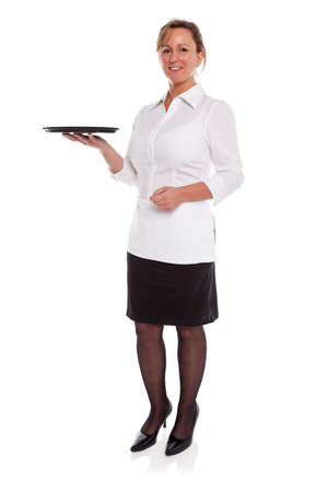 Full length photo of a waitress holding an empty tray, isolated on a white backgroundの写真素材
