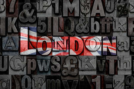 The word London made from old metal letterpress letters with Union Jack coloursの写真素材
