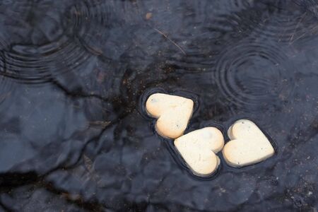 hearts in the water under the rain