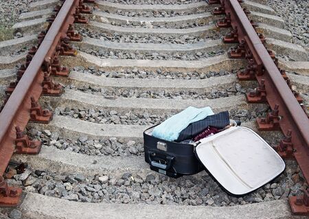 suitcase on the railwayの写真素材